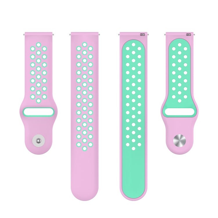 Two-tone silicone watch strap, pink with mint green perforation dots and matching ends.