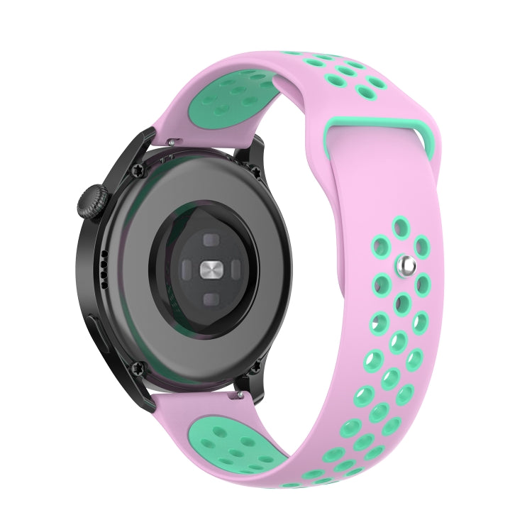 Two-tone silicone watch strap, pink silicone with mint green perforations and silver pin.