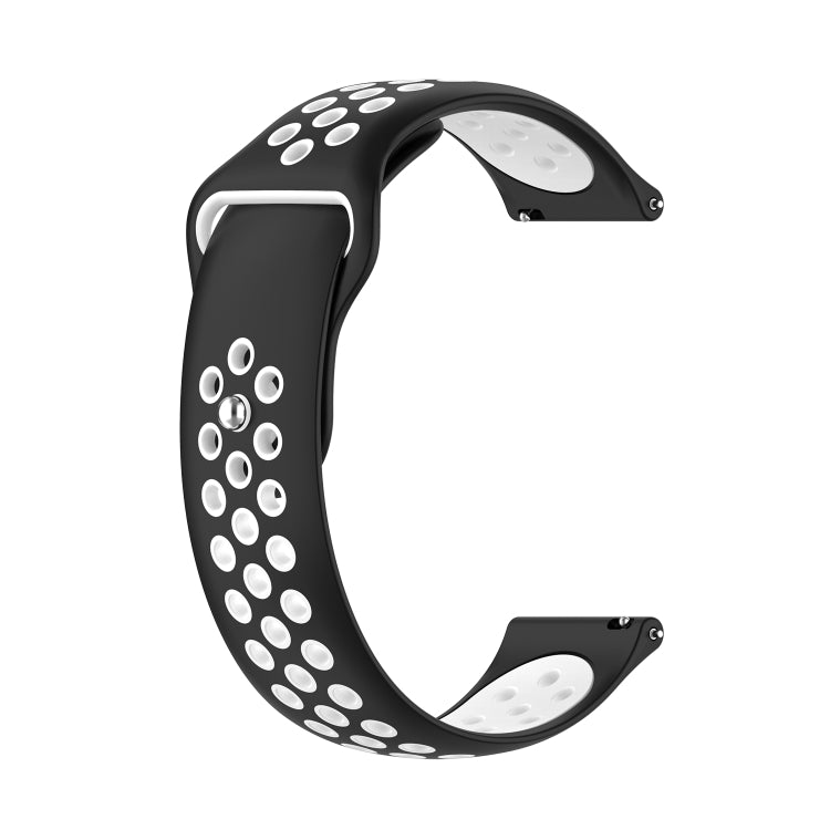 Two-tone silicone watch strap, black with white perforation dots and secure pin end.