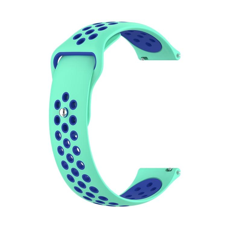 Two-tone silicone watch strap, mint green with dark blue perforation dots and buckle.