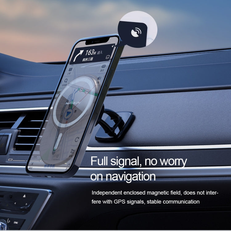 Magnetic car phone holder on dashboard with phone attached