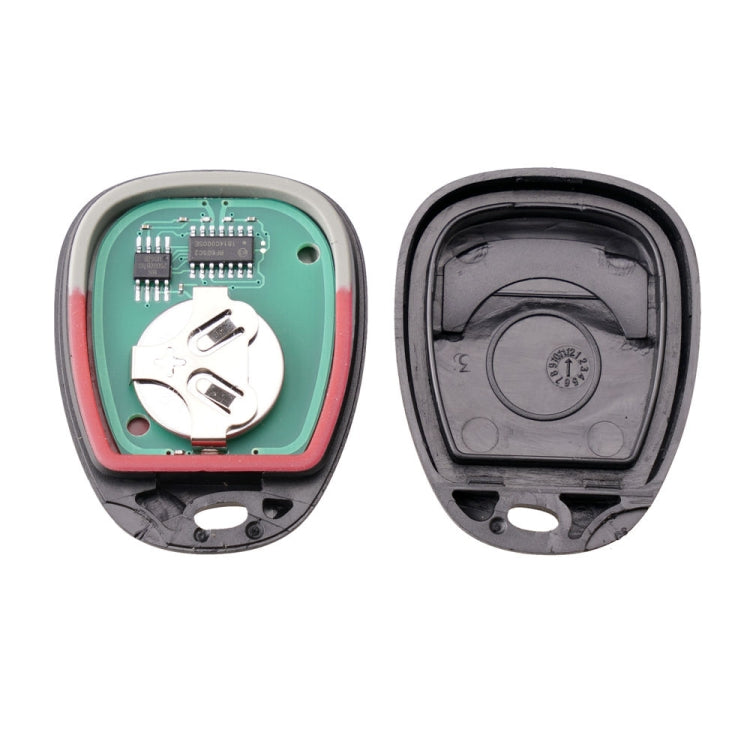 Opened car remote key fob showing circuit board, battery contacts, and button assembly