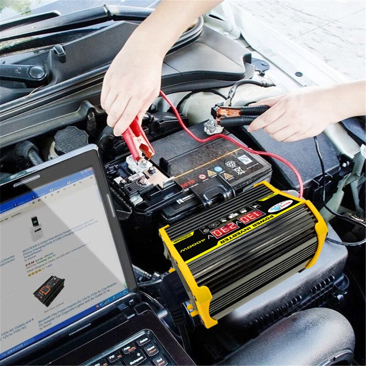 Car power inverter connected in the engine bay with red and black battery cables