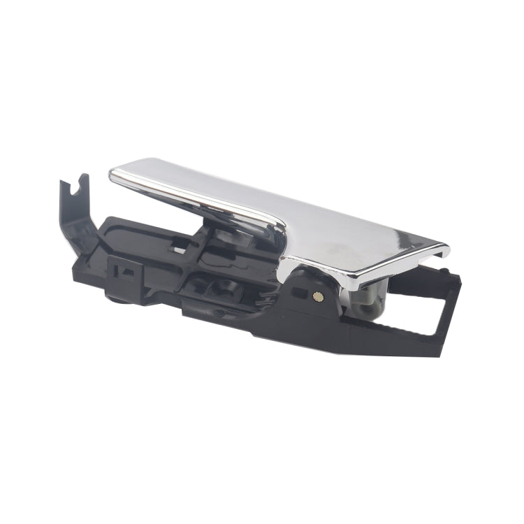 Left inside door handle exterior piece with chrome trim over black frame