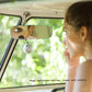Large curved frameless mirror for car, showing clear reflection
