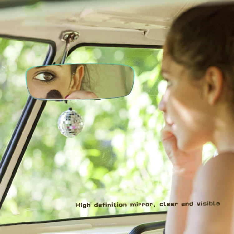Large curved frameless mirror for car, showing clear reflection