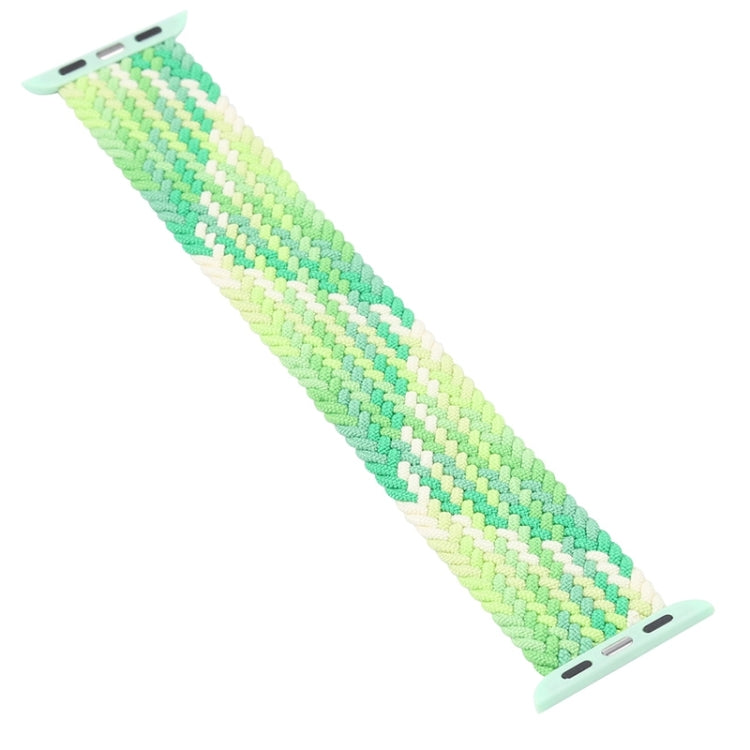Mint and light green woven nylon Apple Watch band laid out, metal pin clasp ends