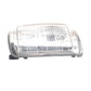 Car mirror indicator lamp cover with clear lens and black base, front view