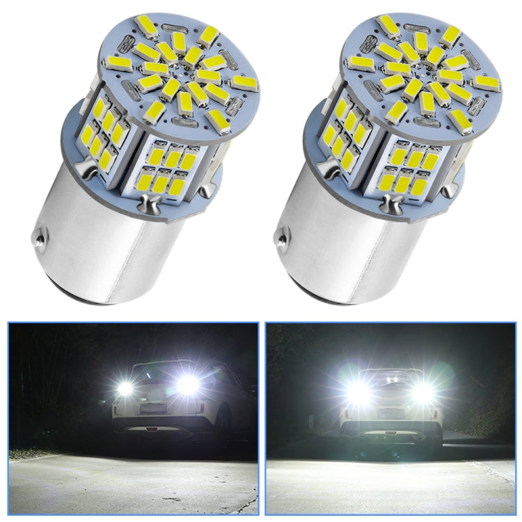 Pair of silver LED car bulbs with white SMD chip clusters, bayonet base, close-up