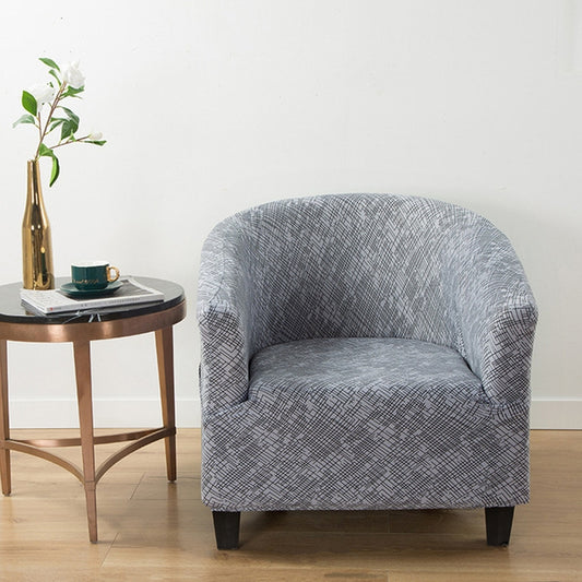 Grey semicircle armchair sofa cover with geometric grid pattern, snug fit over seat