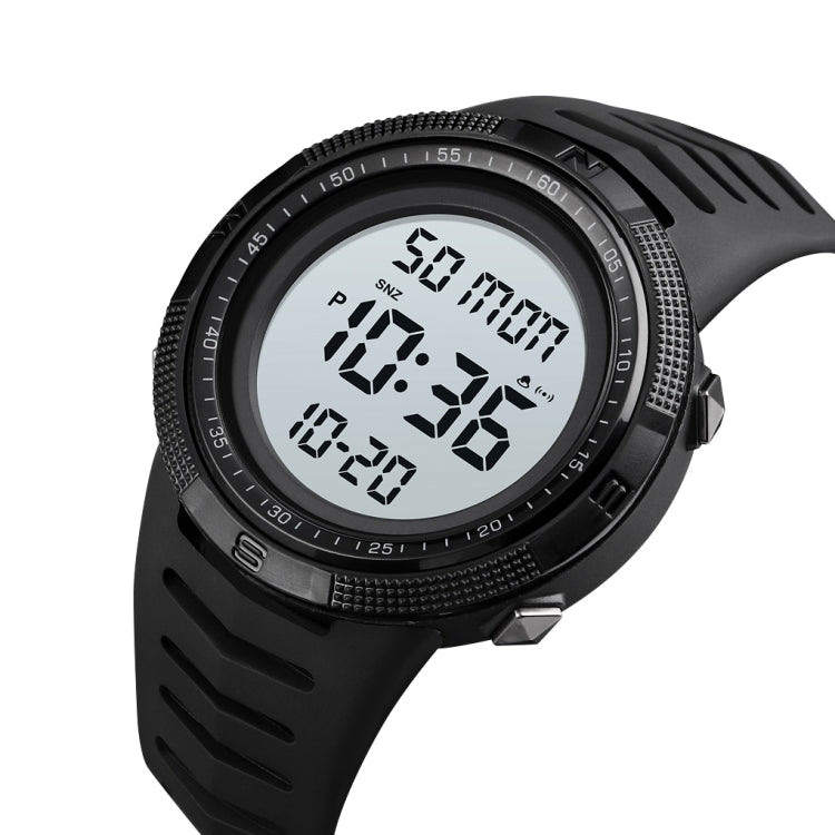 Black electronic dual-time wristwatch with glowing digital display and textured bezel