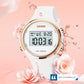 Round LED digital watch with white silicone strap and gold-tone case, luminous display