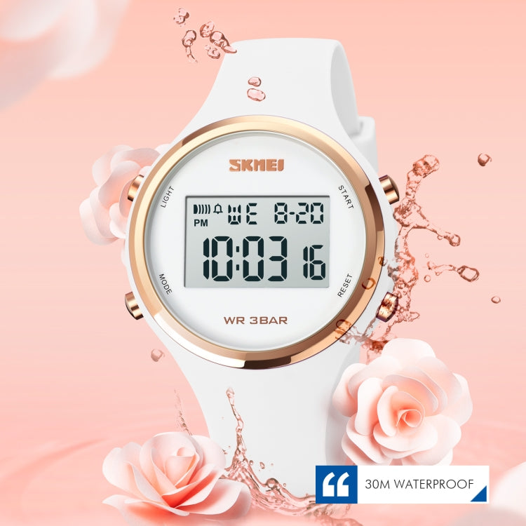 Round LED digital watch with white silicone strap and gold-tone case, luminous display