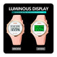 Round LED digital watch with pink silicone strap, shown in normal and light display modes