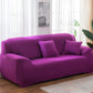 Purple elastic full sofa cover with snug wrap over sofa cushions and arms