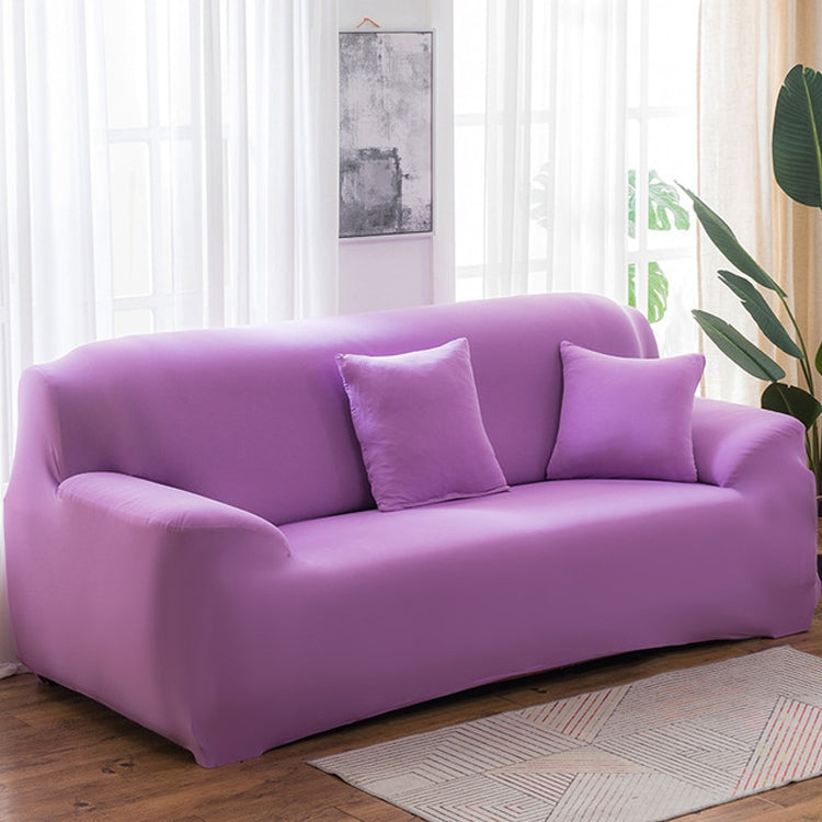 Solid-color full-coverage sofa cover in lilac purple with three matching cushions