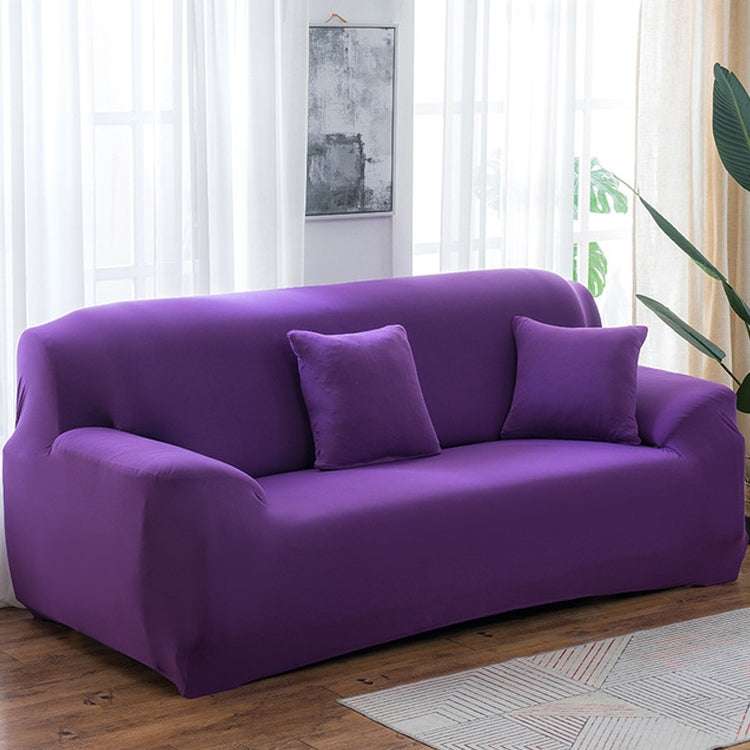 Purple elastic full-coverage sofa cover with non-slip fit, draped over arms and back
