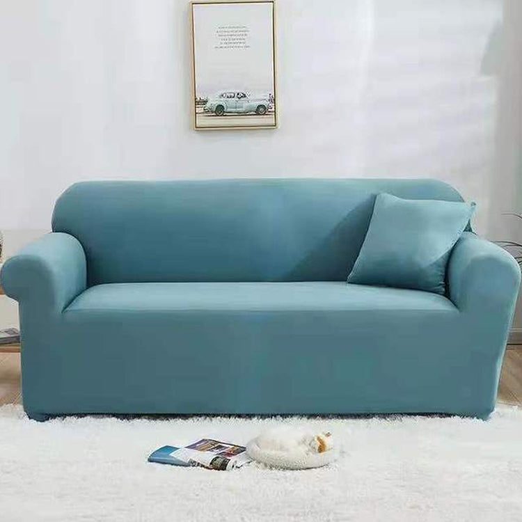 Blue-green elastic full-coverage sofa cover with non-slip fit, covering seat and arms