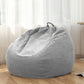 Light grey corduroy bean bag chair cover on floor with top handle