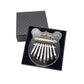 Mini 8-tone kalimba with clear heart body and metal tines, in black case