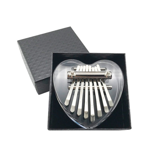 Mini 8-tone kalimba with clear heart soundboard and metal tines, in black case