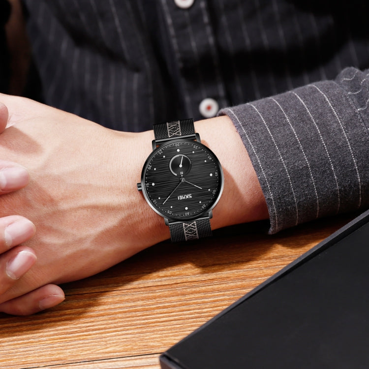 SKMEI men’s quartz wristwatch on wrist with black dial and black mesh strap