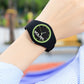 Ladies silicone strap quartz watch, black strap with round green-accent dial