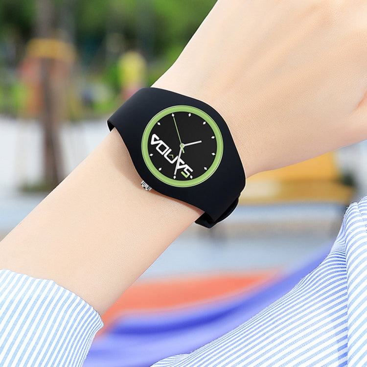 Ladies silicone strap quartz watch, black strap with round green-accent dial