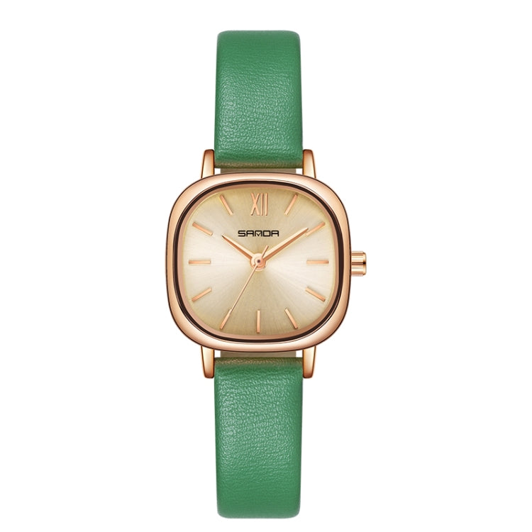 Women’s quartz watch with green leather strap and oval cream dial
