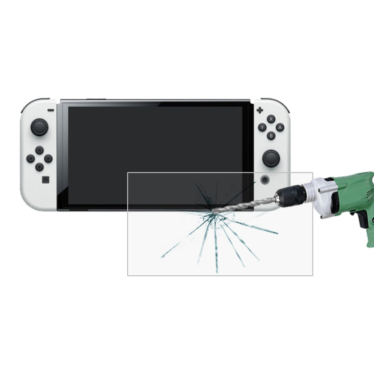 Tempered glass screen protector film with crack-protection graphic over handheld screen