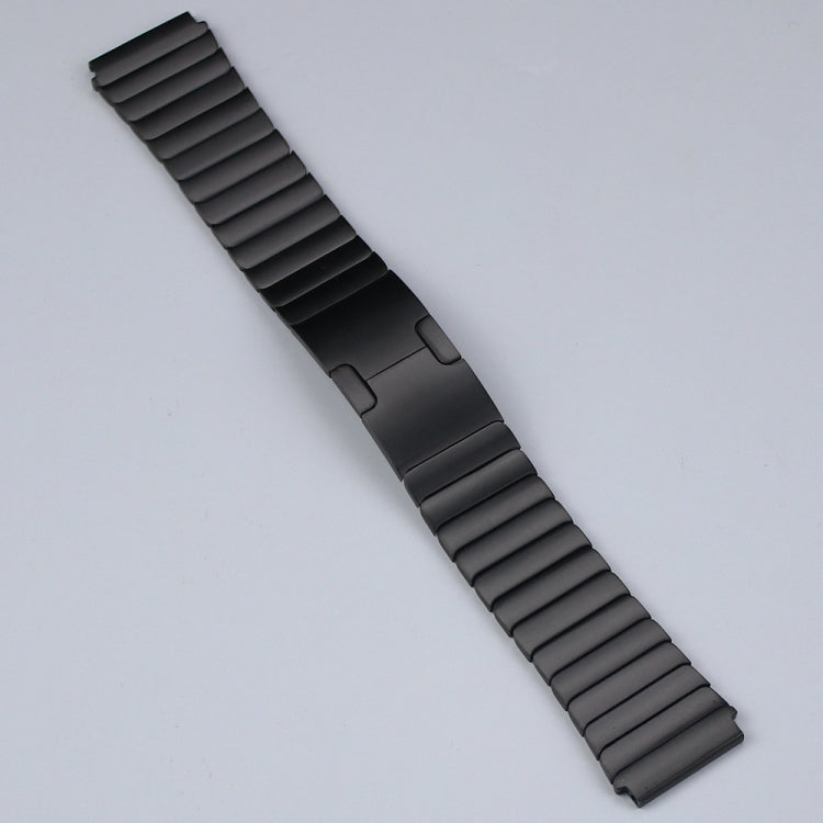 Black stainless steel watch strap with ribbed link segments and buckle end