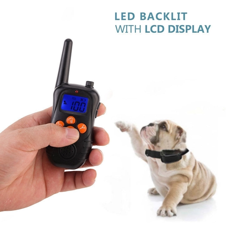 Handheld dog training remote with LCD display, antenna, and orange button accents
