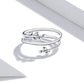Sterling silver open multi-loop ring with small leaf ornaments, top view