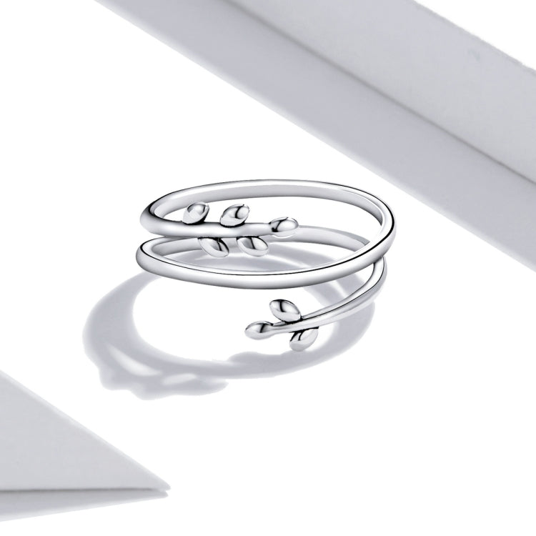 Sterling silver open multi-loop ring with small leaf ornaments, top view