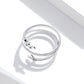 Sterling silver open multi-layer ring with leaf charm detail, side view
