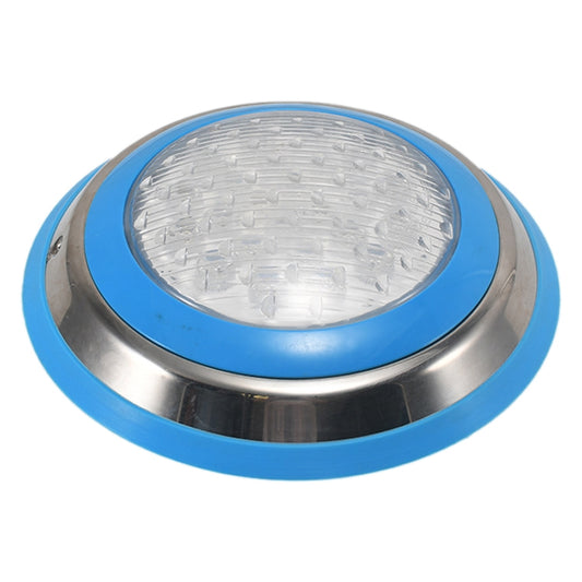Angled stainless steel LED pool light with blue bezel and clear lens