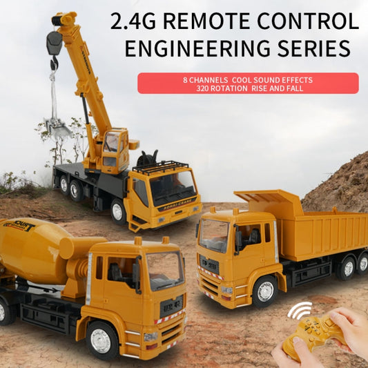 Multiple yellow remote control construction trucks with hand-held controller