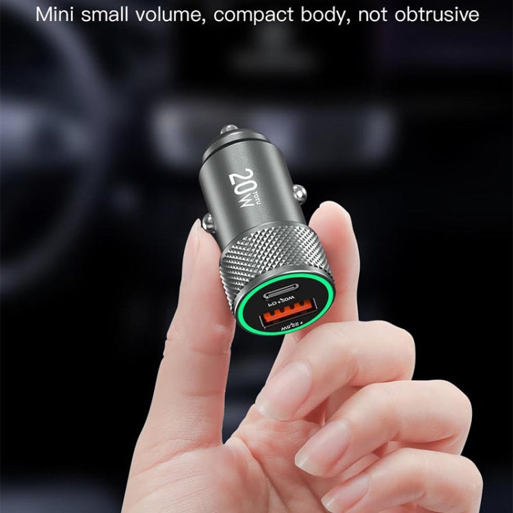 TOTU 20W compact car charger held in hand, textured grip and PD screen