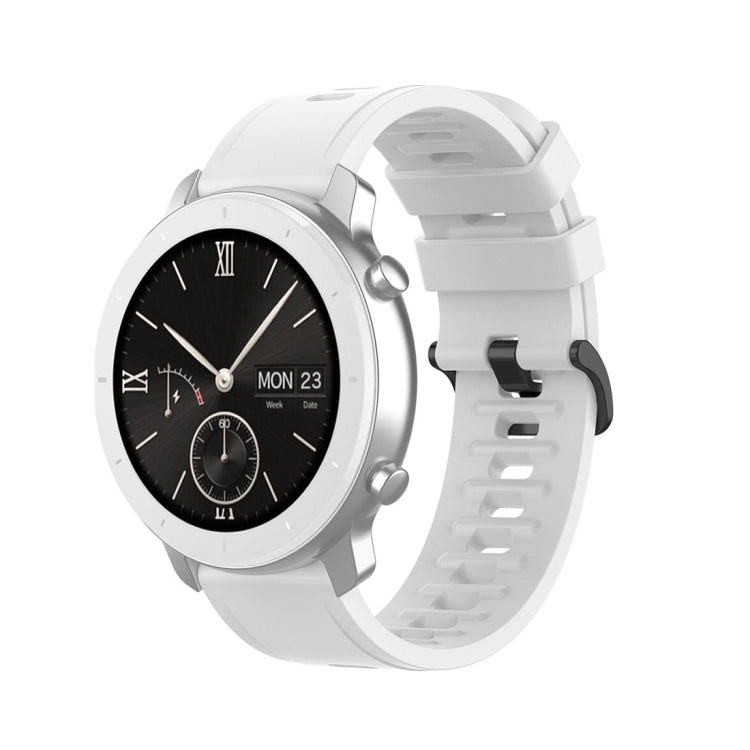 White silicone smartwatch replacement strap with perforated holes and secure buckle
