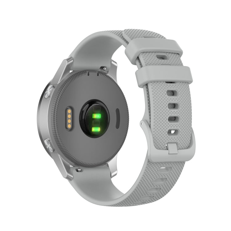 Light gray silicone smartwatch strap with textured surface and rectangular clasp