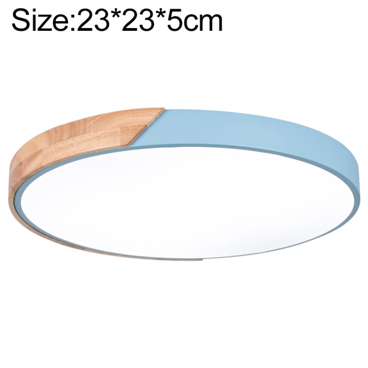 Round LED ceiling lamp with wood accent and light blue outer ring