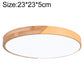 Round LED ceiling lamp with wood accent and yellow outer ring