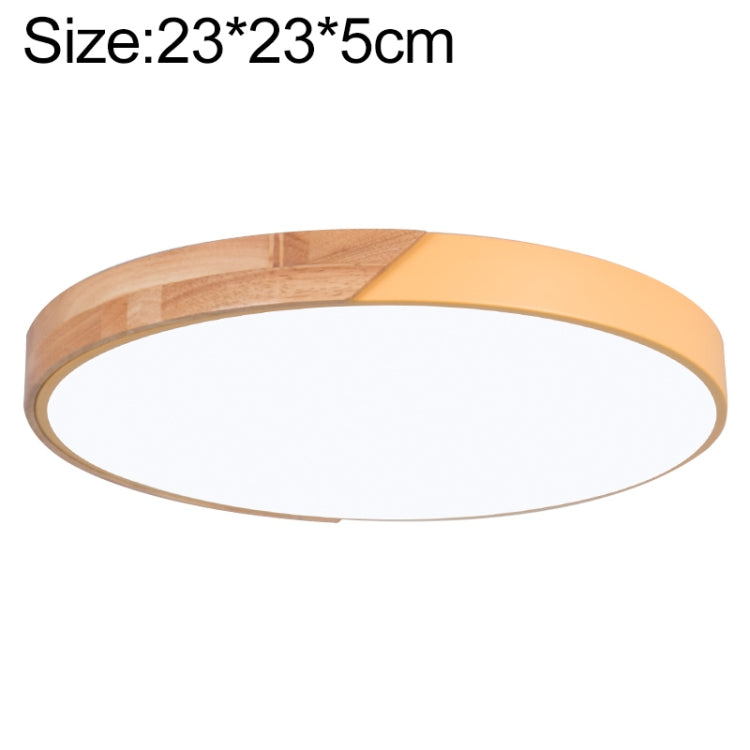 Round LED ceiling lamp with wood accent and yellow outer ring