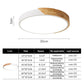Round flush-mount LED ceiling lamp with white diffuser and curved wood-accent rim.