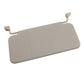 Beige adjustable car sun visor with side clips and center seam, angled view