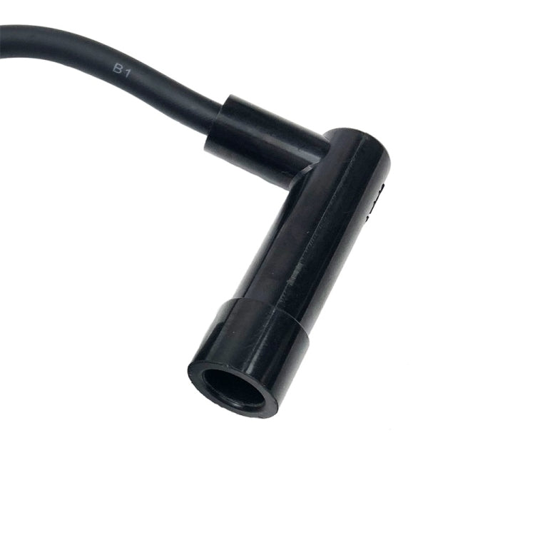 Ignition coil spark plug boot and insulated wire lead