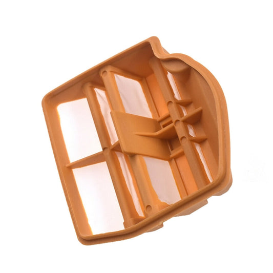Chainsaw air filter element with orange plastic housing and white media, 3/4 view.