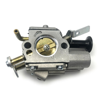 Metal chainsaw carburetor with fuel inlet and mounting bracket, silver/black