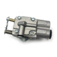 Chainsaw carburetor side view with adjustment screw, silver housing and black primer bulb