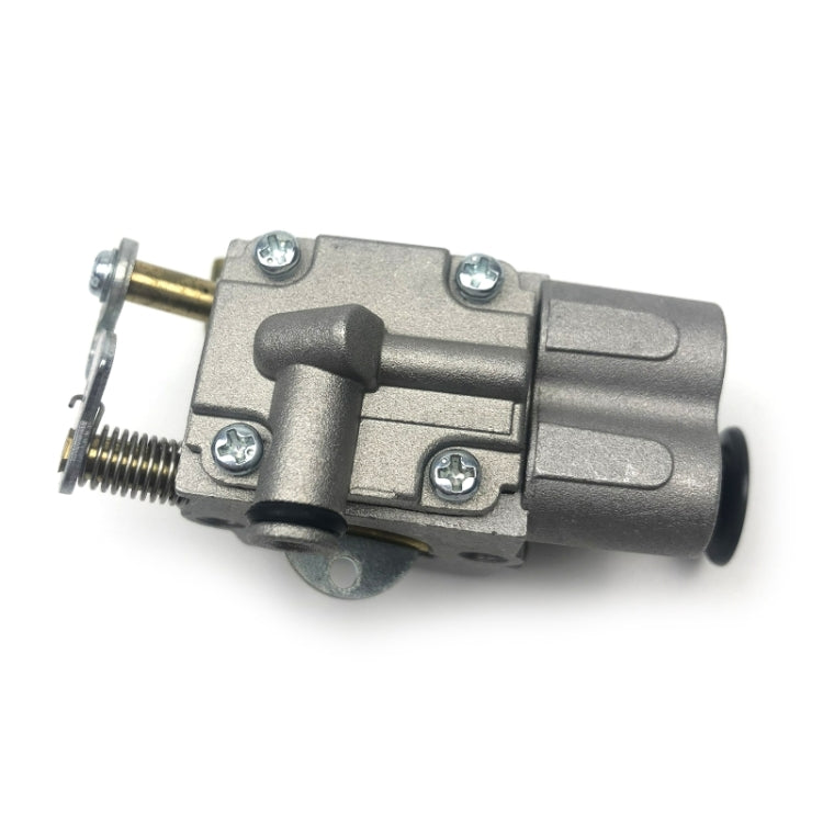 Chainsaw carburetor side view with adjustment screw, silver housing and black primer bulb